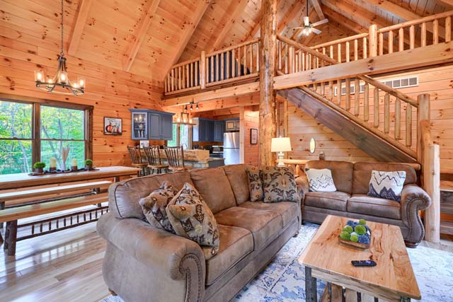 Inviting log cabin space with comfortable seating