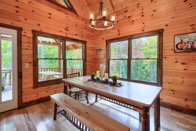 Charming log cabin kitchen with vintage decor