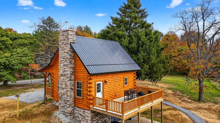 valley view cabin kitchen with stainless appliances and granite countertops