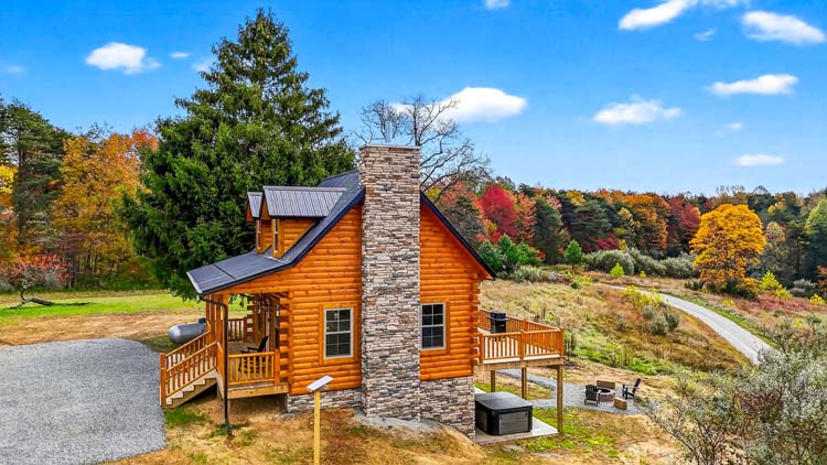 valley view cabin cabin nestled in wooded landscape