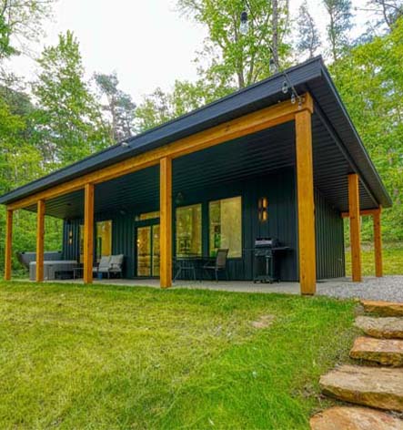 Dream Weaver Cabin at Trickle Creek side and back of at Trickle Creek