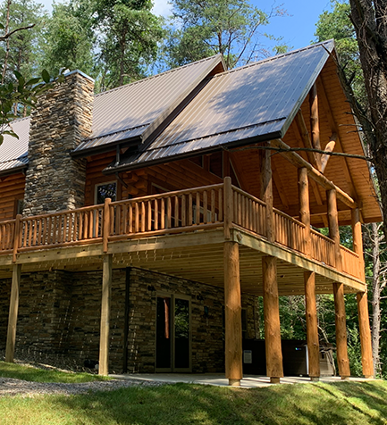roses retreat at Trickle Creek double deck, wrap around deck, mental roof